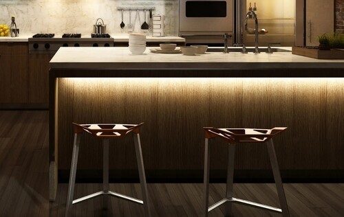 Kitchen island with LED underlighting and modern bar stools