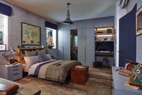 blue bedroom with fitted wardrobes