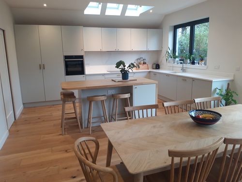 modern bespoke kitchen with wooden worktop