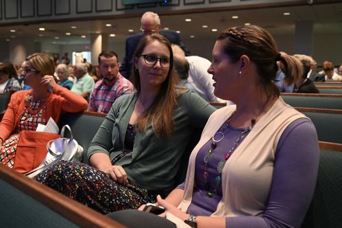 Women fellowshipping in the sanctuary
