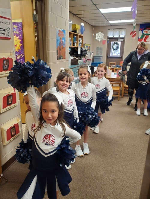 Children playing upward basketball