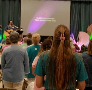 Women in worship at First Baptist Church Sevierville