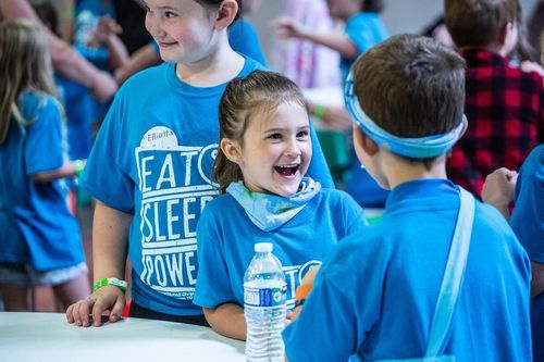 children in blue t-shirts