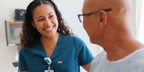 female nurse aide with patient