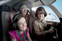 people in airplane cockpit