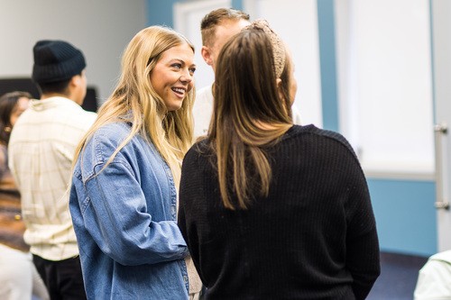 Two women engaged in conversation