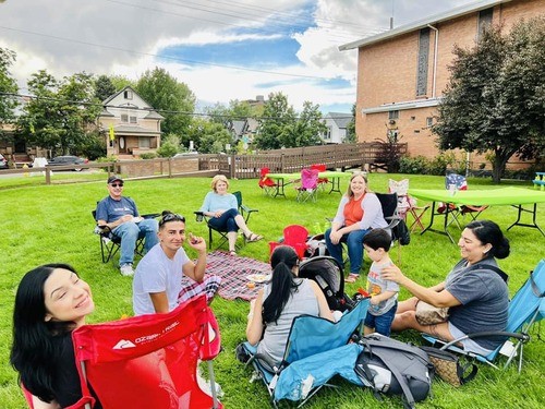 Life Group meeting together on the church lawn