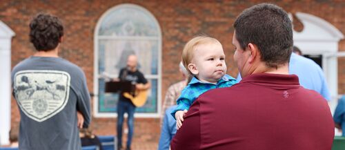new pleasant baptist church, kids, nursery, kids church, children church, father holding son, man holding baby, family worship, family unit, man holding baby at church, baby during worship,