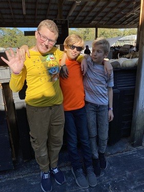 Group of Elevate Students posing at White's Farm. 