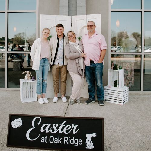 Family walking into church to attend Easter service