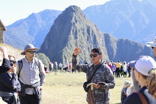 Our guide, Jacob, explaining the history of Macchu Picchu, Peru