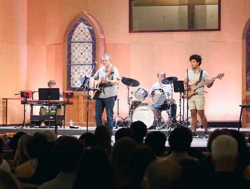 Church musicians performing for congregation.