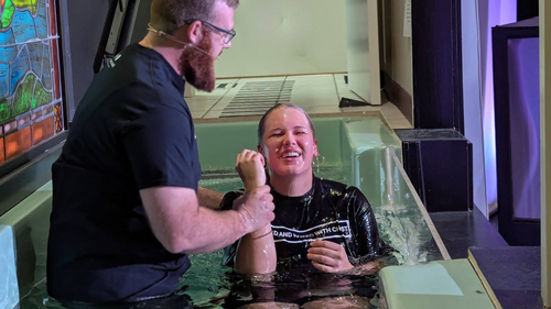 Pastor Brandon baptizes a new believer at Wake Cross Roads Baptist Church