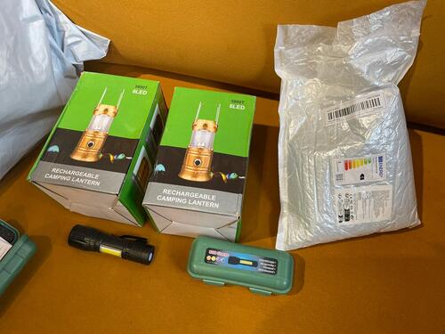 Essential items such as small lamps and power banks purchased with loving donations