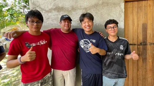 Alvin with friends he made in Honduras