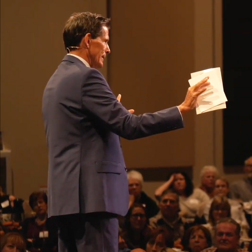 Dr. Bob Speaking to Event Crowd