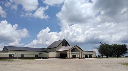 Picture of older man being baptized