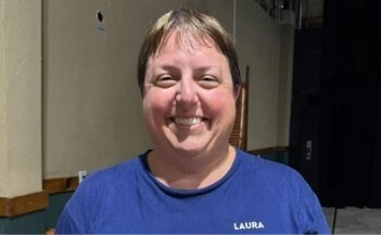 Laura in her volunteer shirt.