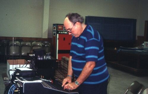 Man using old sound system.