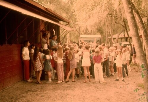 Old photo of children outside out Dining Hall.