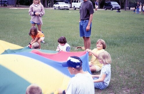 Children playing with parachute.