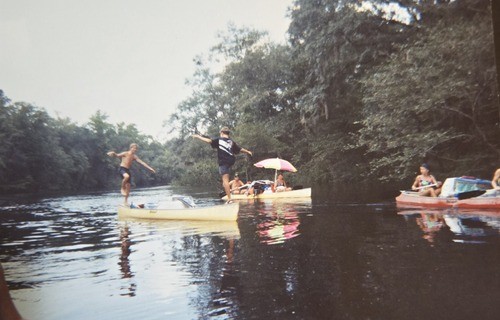 Old picture of people playing in original lake.