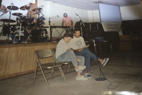 Couple sitting in front of Stage.