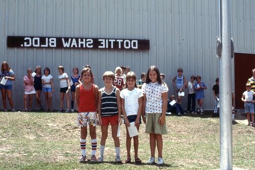 Children in front of event center.