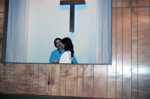 Baptism, perhaps at a church.