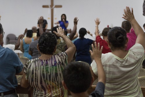Praying for a young girl in Belize.