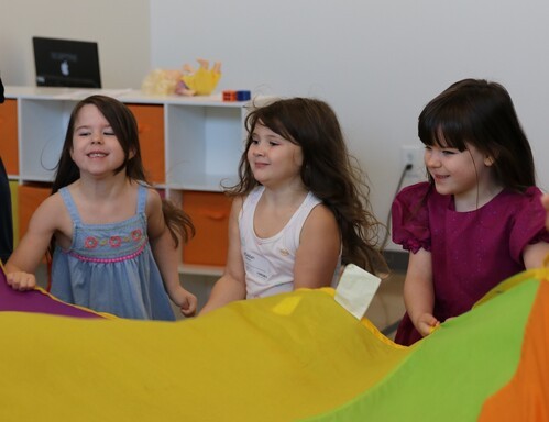 Three children at kids church enjoying a great time at Crossroads Church Virginia