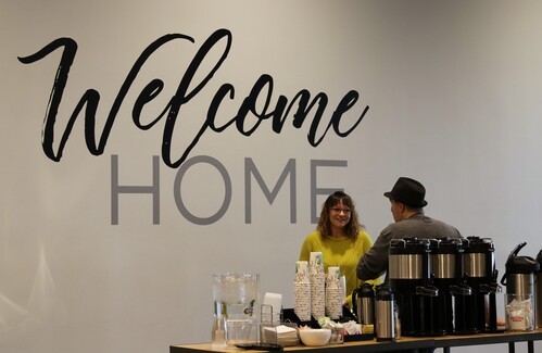 People enjoying their company at church in Fredericksburg