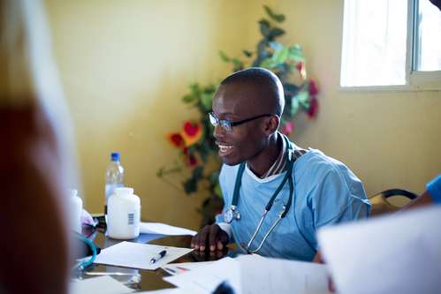 a doctor speaking with a patient at the good news clinic of florida city florida
