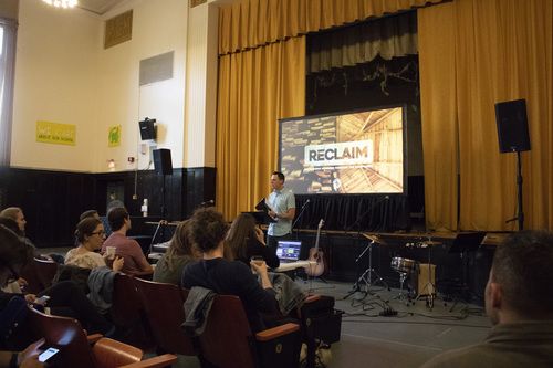 A group of people in a church service at Curly K-8.