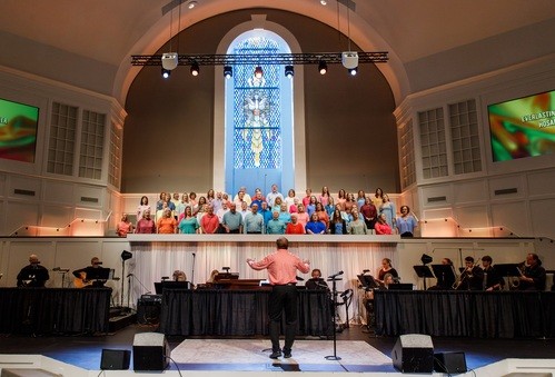 Bro. Ken Reich leading the choir singing 