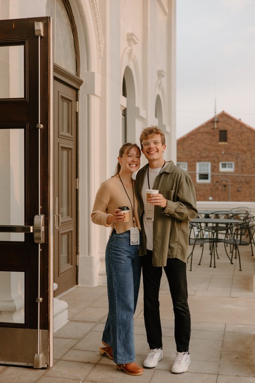 four women of various ages sitting around a table in Bible study