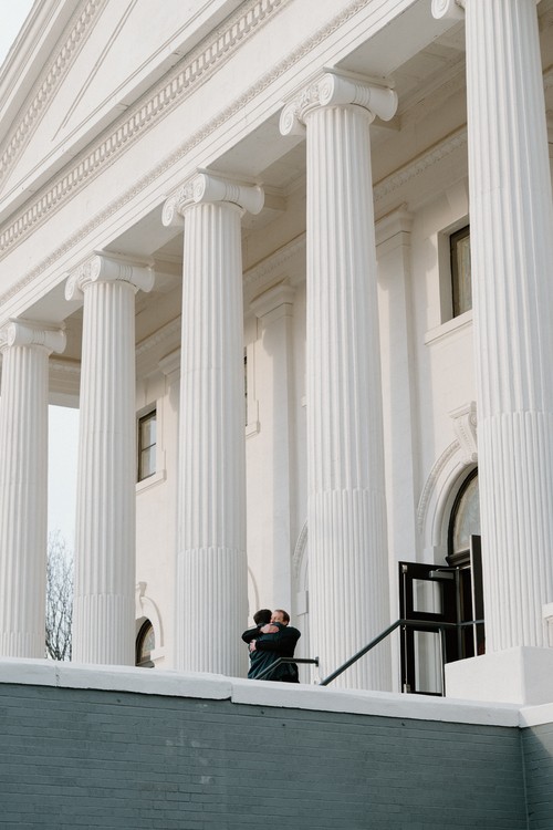 Two raised hands in worship, one in front of the other