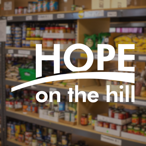 Photo of a fully stocked food pantry at Hope on the Hill