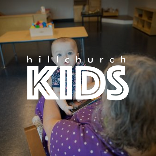 Photo of a serve team member holding a baby at Church on the Hill