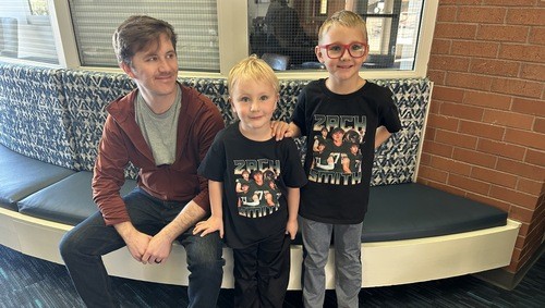 A proud dad & his boys at Equipped Church Highlands Ranch