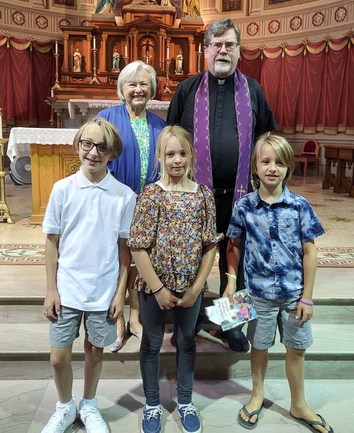 William Wolff, Adam Wolff and Rona Cesler celebrated First Reconciliation on Aug. 27.