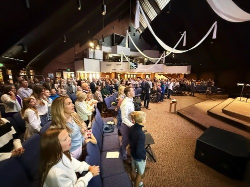 Pastor Andrew Farhat preaching in the Worship Center