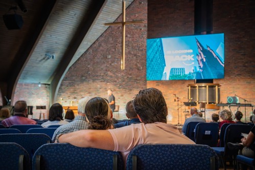 People gathered in community room