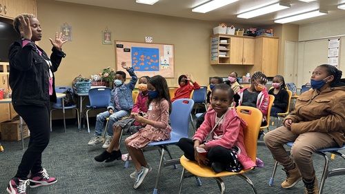 Sister Shirl Bolen leads an 11am Sunday School session