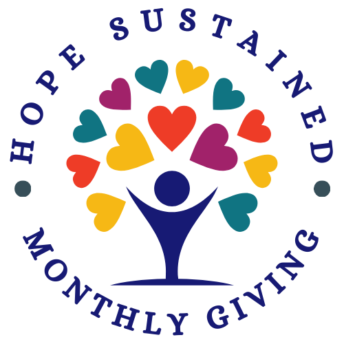 Hope Sustained Monthly Giving logo featuring a tree with colorful heart-shaped leaves, symbolizing growth, love, and support, with a figure at the base representing unity and hope. The text 'Hope Sustained Monthly Giving' encircles the design in a rounded format.